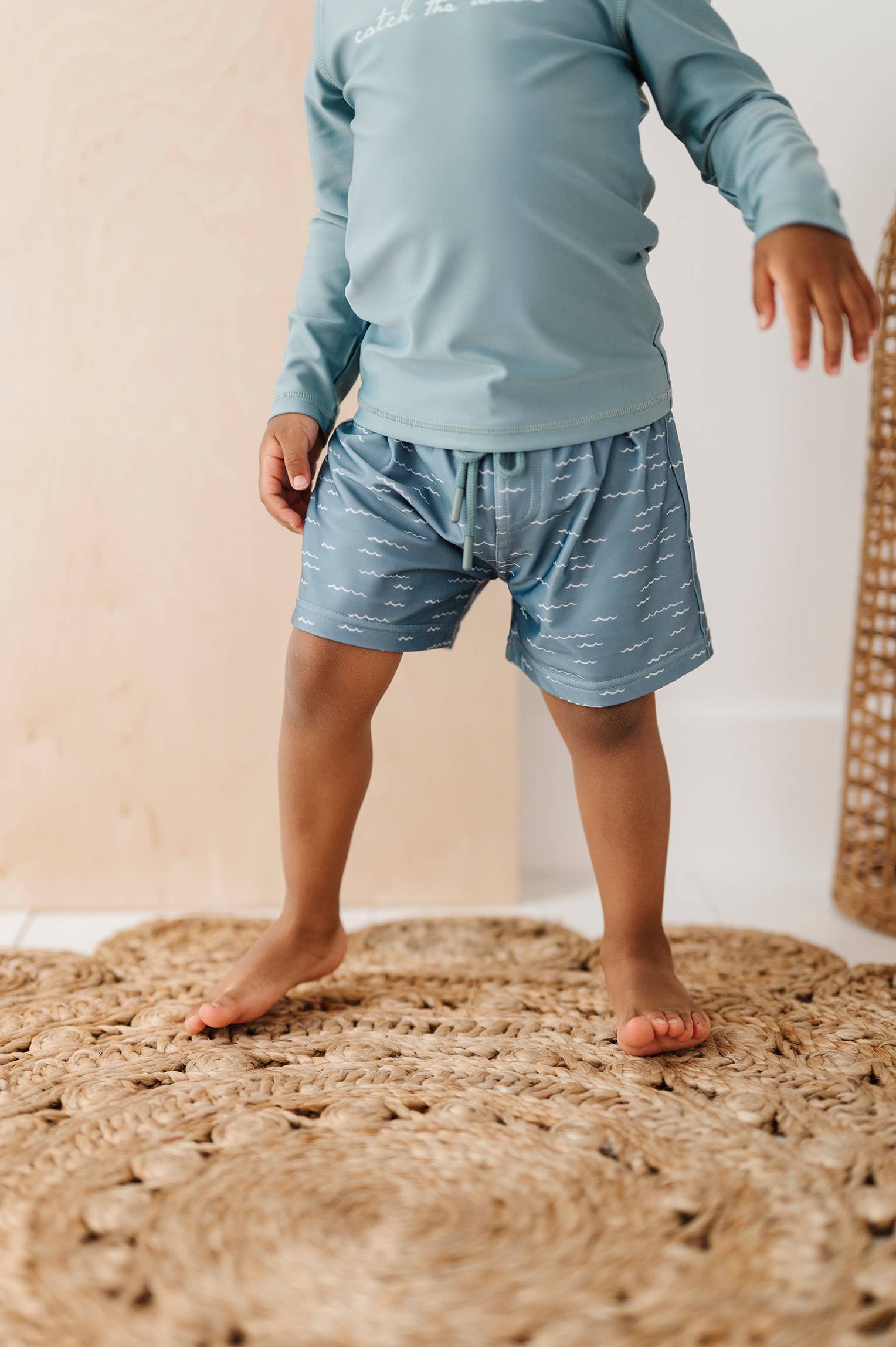 Boy's Swim Shorts in Waves